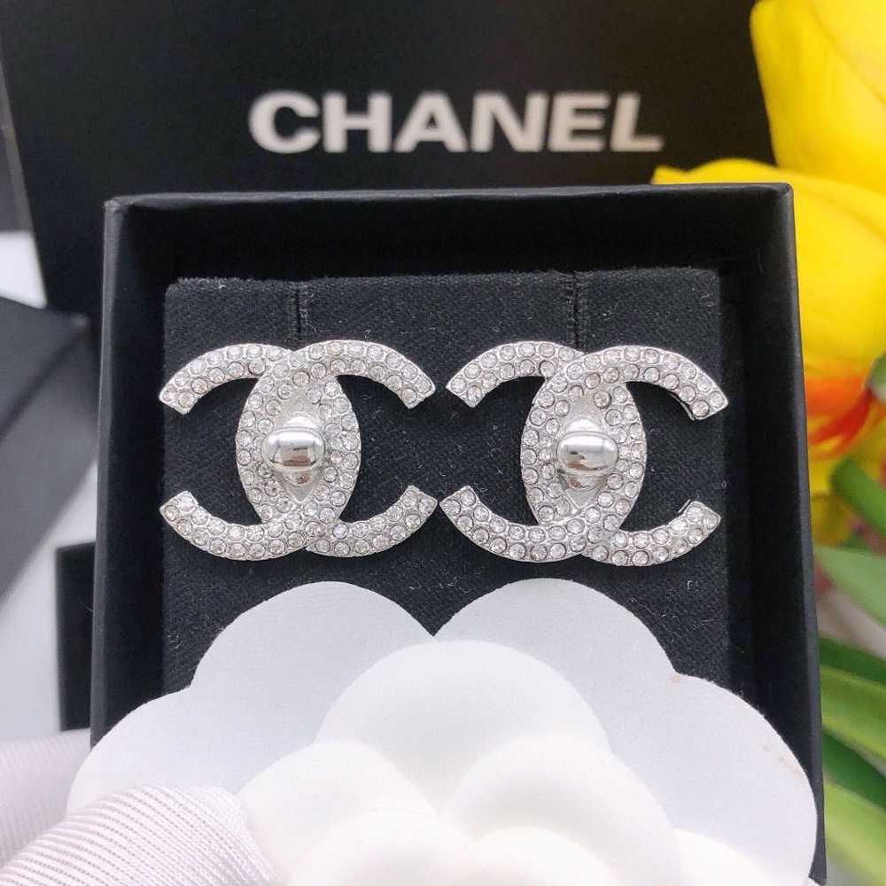 CHANEL Silver and White Crystal Logo Earrings